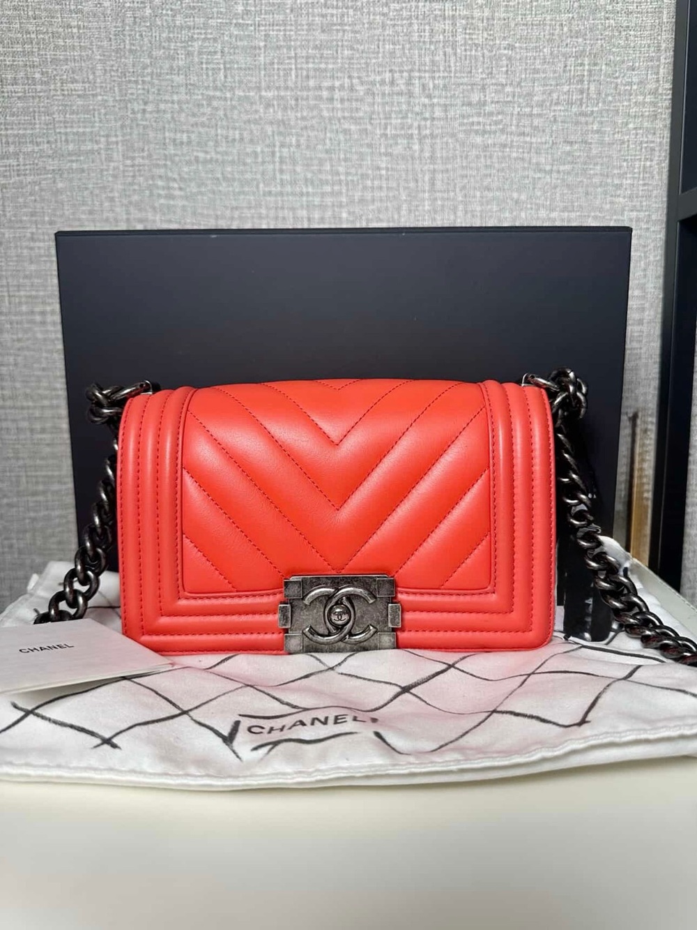 CHANEL Quilted Chevron Leather Boy Bag - Coral